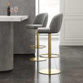 Gray velvet swivel bar stool with curved back and adjustable height, perfect for kitchen or bar seating